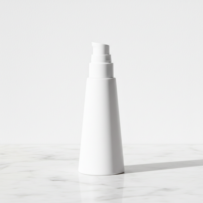 Low side angle view of all-matte white tapered pump bottle showing silhouette profile on white marble